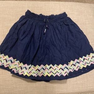Cat and Jack. Size 14/16. Navy skirt with pattern.